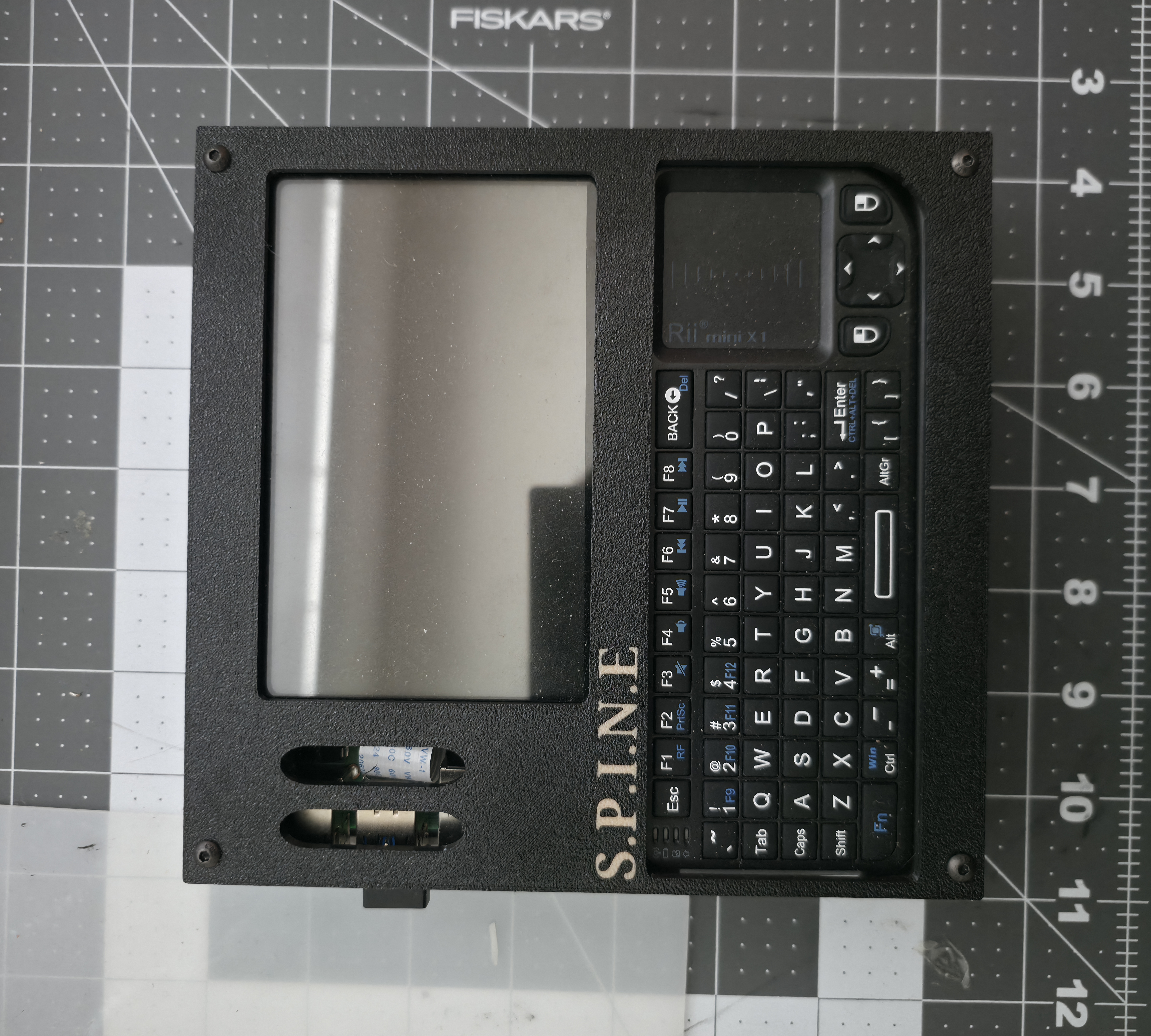 Picture Of S.P.I.N.E Computer On Desk